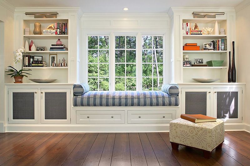 Window Seats Between Two Bookshelves