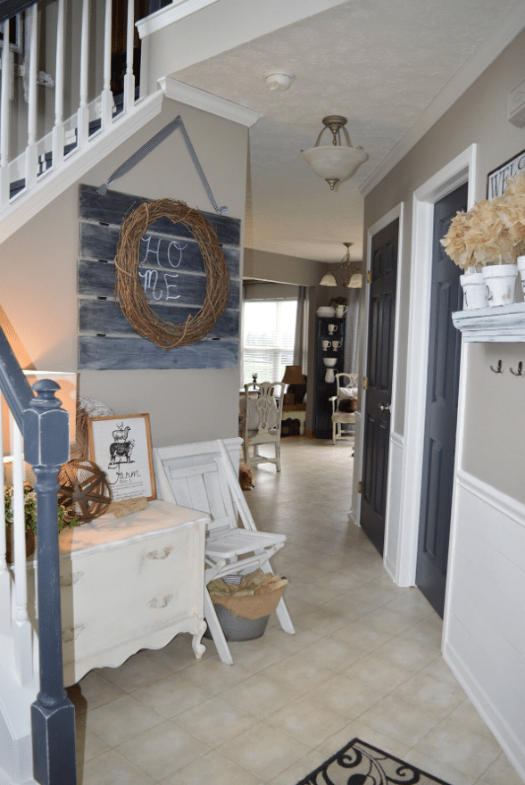 Garland and a Slate Picket Sign in a Corner Nook