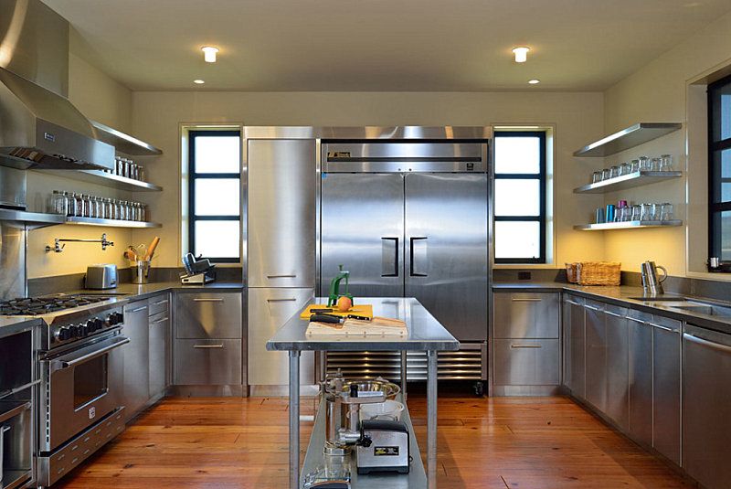 industrial kitchen with steel fridge