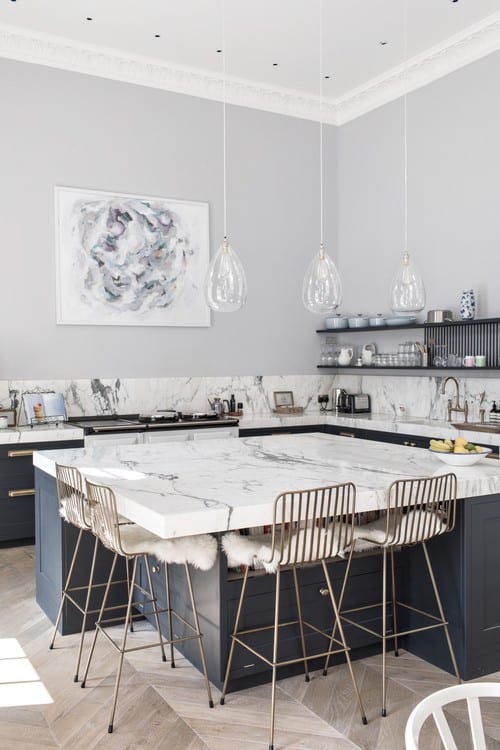 Combine Grey Shaker Cabinets with Brass Accents in kitchen 