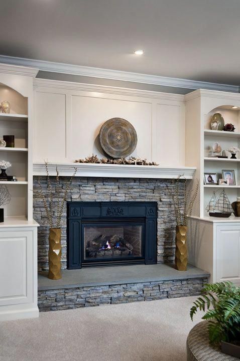 A French Armoire Against the Wall Next to The Mantel