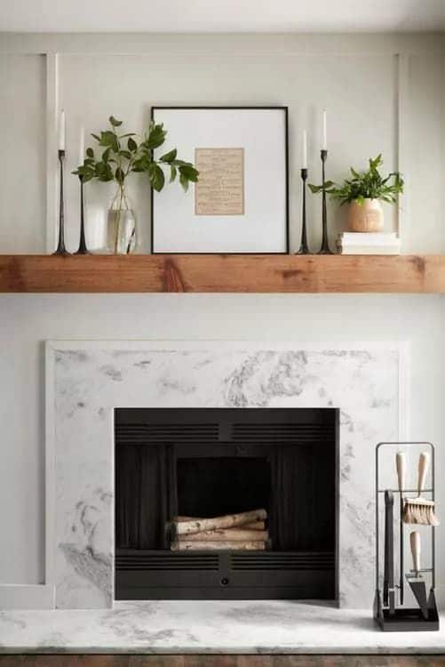 A Pair of Antique French Urns on Either Side of The Mantel