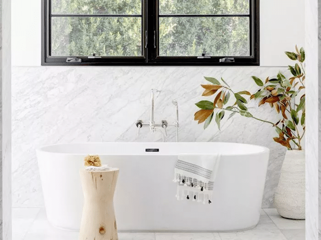 white bathtub with a splash of the dark 