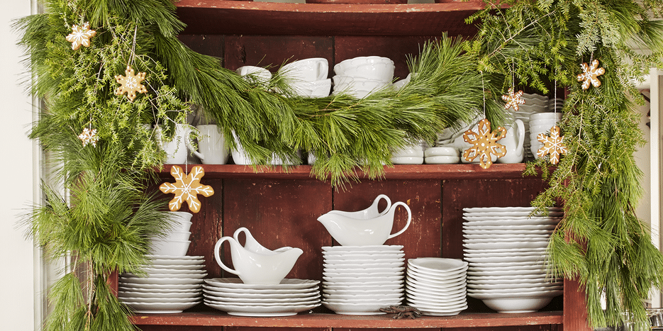 winter decor pinecones, greenery, and branches