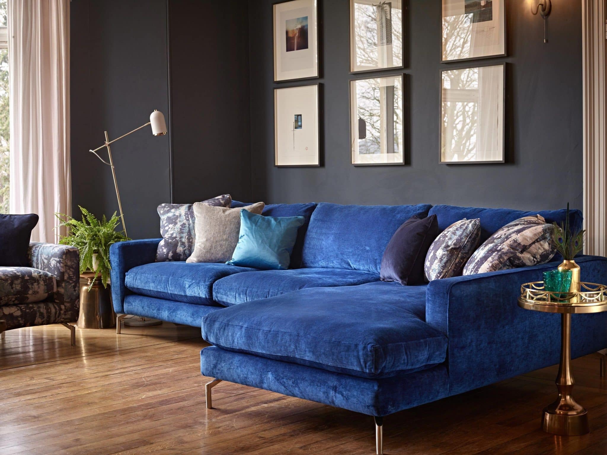 How to style a blue velvet sofa in a modern living room