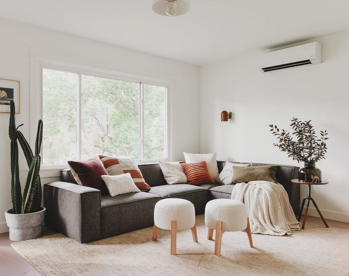 Can a Black Couch Fit Into a Light-Colored Living Room