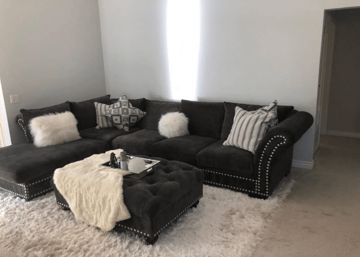 How to Create a Cozy Vibe with a Black Couch in a Living Room A House in the Hills