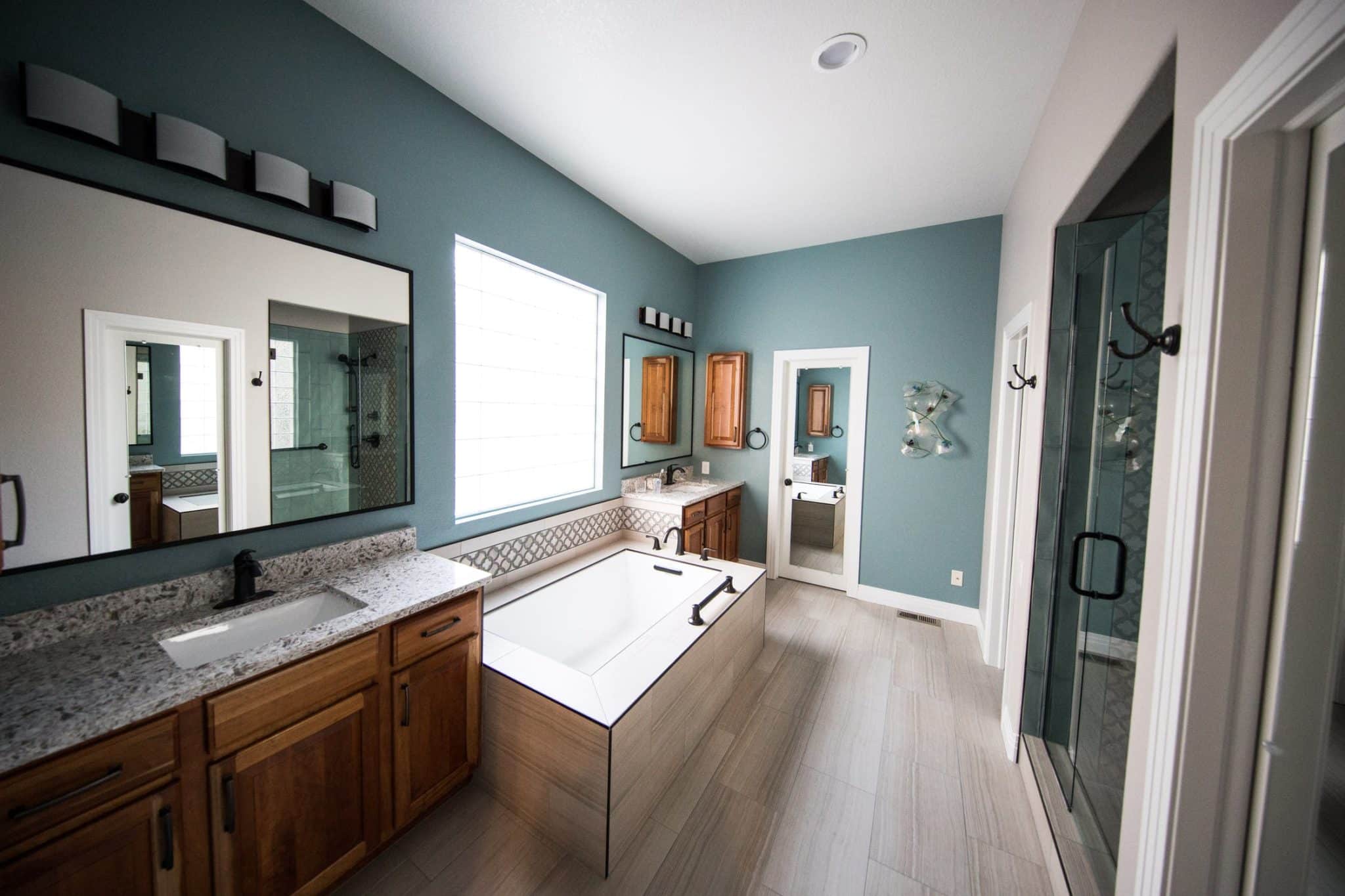 What Types of Finishes Work Well in a Dark Green Bathroom