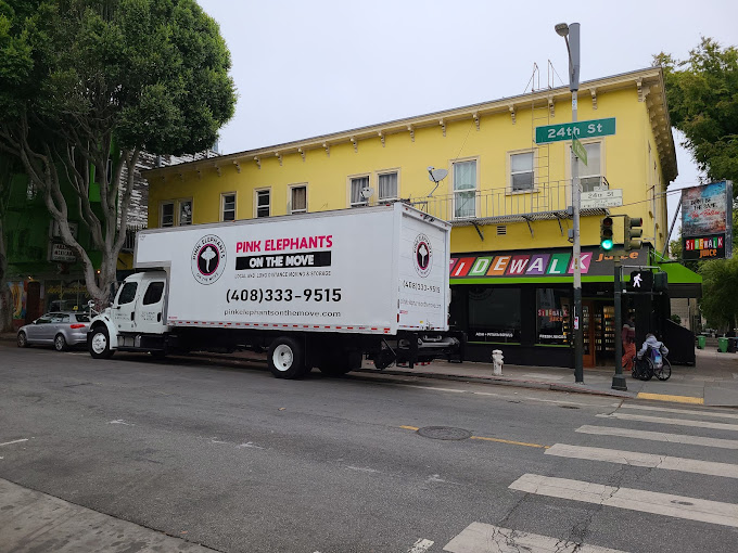 A white truck on the street Description automatically generated