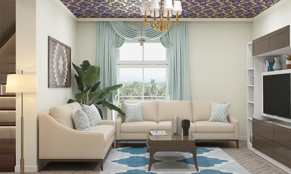 A living room with a blue and white patterned ceiling,