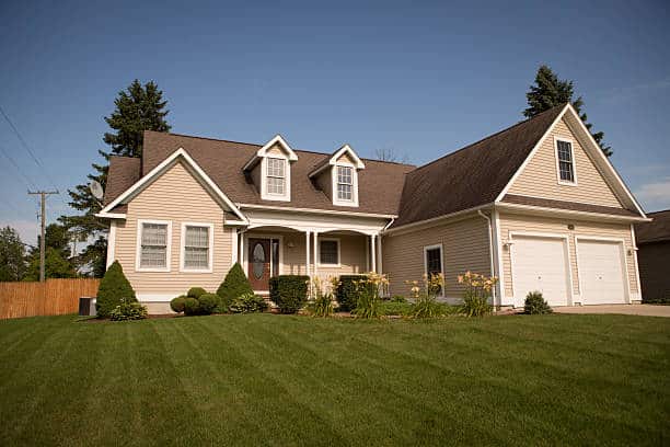 A spacious ranch-style home with a sprawling yard, perfect for outdoor activities and relaxation