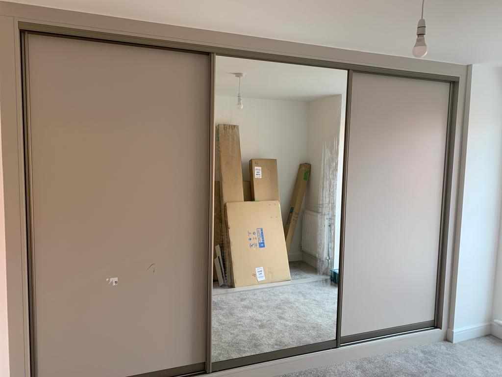 Vinyl Covered Sliding Wardrobe